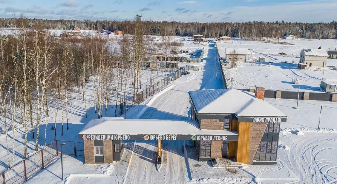 Въездные знаки поселка зимой