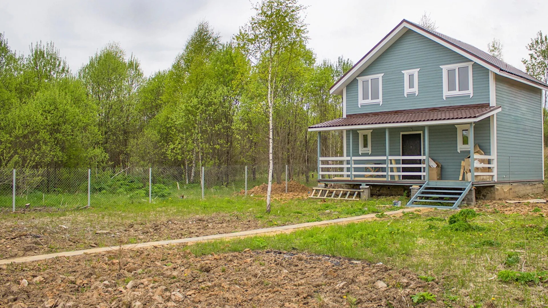 Поселочный 2-этажный дом